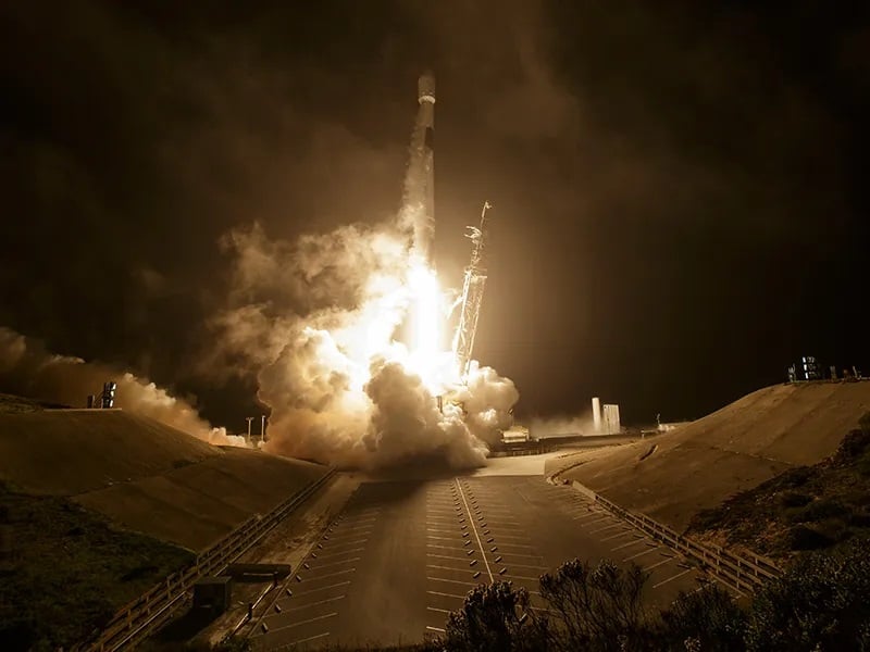 A fiery rocket launch shows a great explosion on the Earth as the rocket blasts into the atmosphere